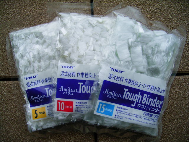 50g/袋(現場調合用/繊維長：5・10・15㎜)。使用量の目安はカタログ参照。