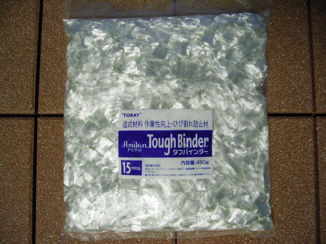 450g/袋（ミキサー車投入用/繊維長：15㎜)。使用量の目安はカタログ参照。